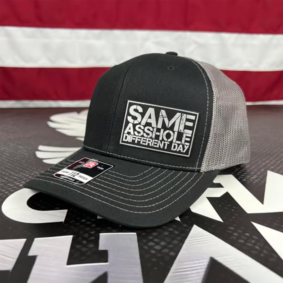 SAME ASSHOLE DIFFERENT DAY Hat